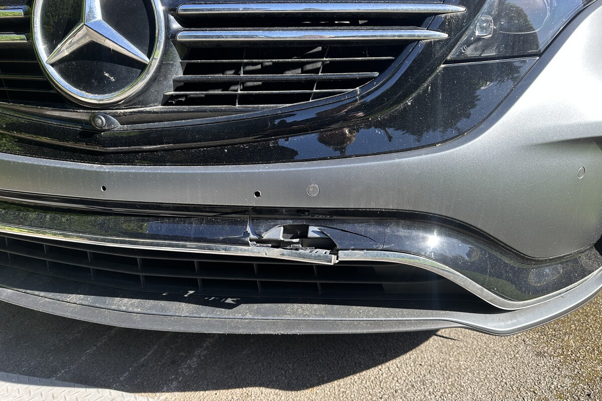 Damaged cracked bumper before repair