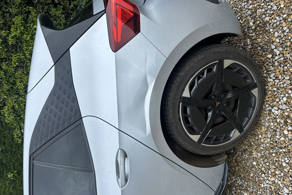 Dent on rear quarter panel before repair
